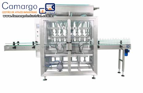 Envasadora para l�quidos, materiais viscosos, pastas e molhos com tampadora e rotutadora